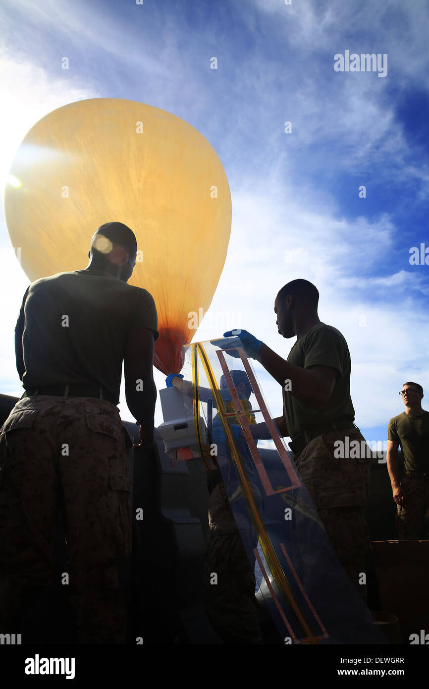 - U.S. Marines with S-6, 13th Marine Expeditionary Unit, launch a Combat SkySat communication system during their Western Pacifi Stock Photo