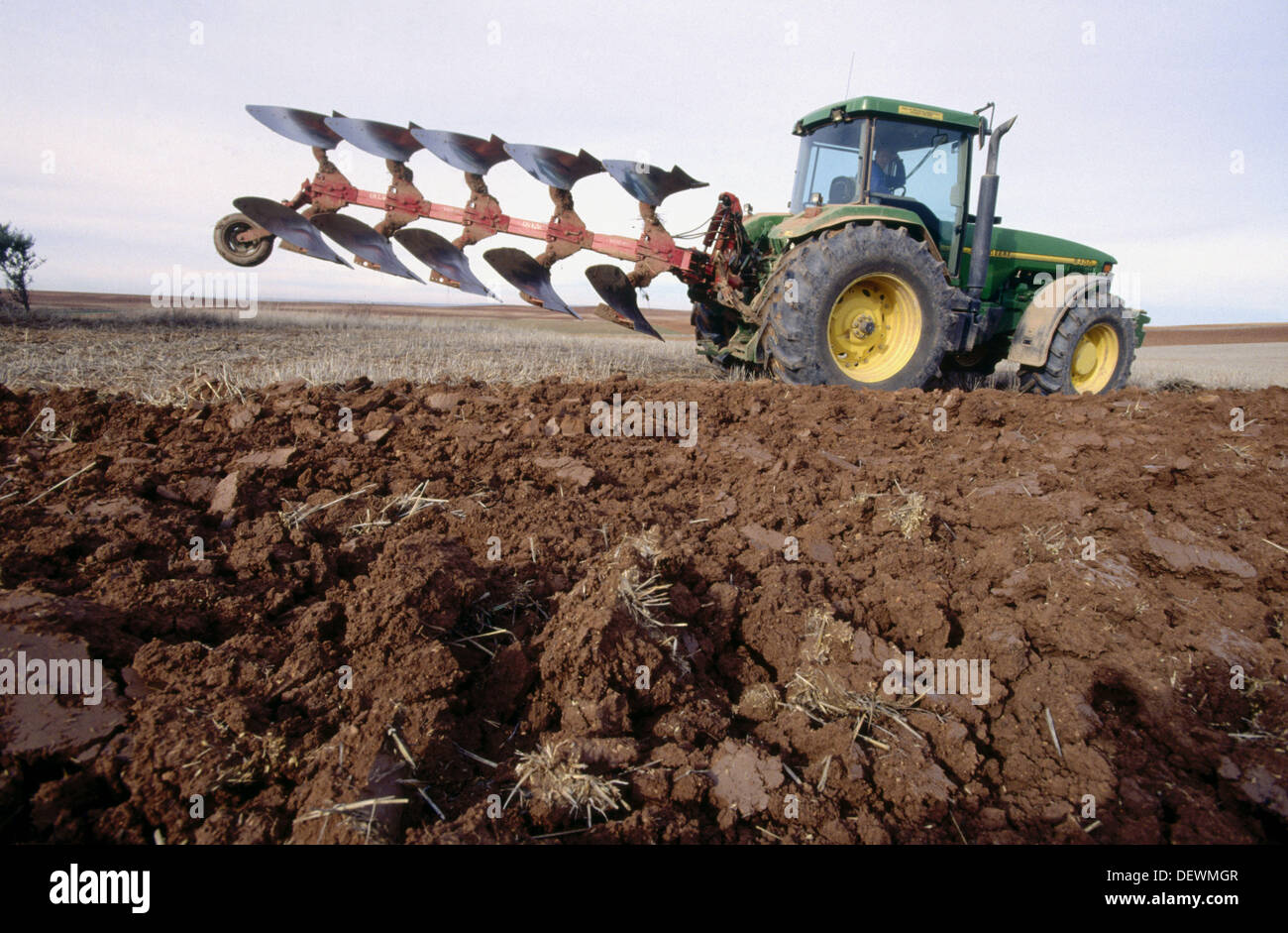 Tractor ploughing field. Spain Stock Photo Alamy
