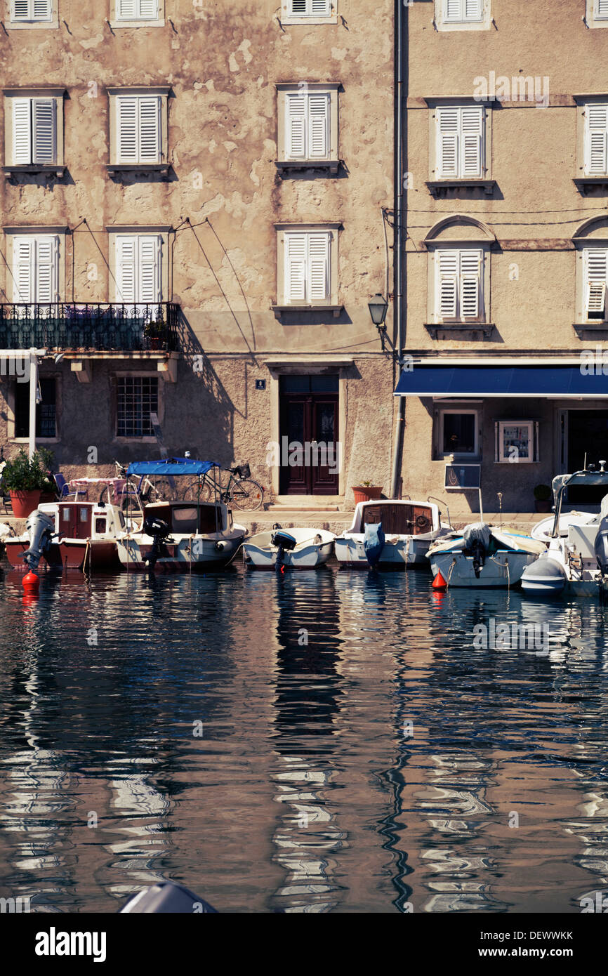 Waterfront house in Cres with reflection in the water. Croatia Stock