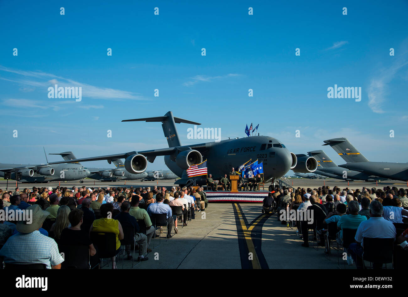 Members of Joint Base Charleston, Boeing, the local community and other distinguished visitors gather for a ceremony held to commemorate the delivery of the final U.S. Air Force C-17 Globemaster III, P-223, Sept. 12, 2013, on the flight line at Joint Base Stock Photo