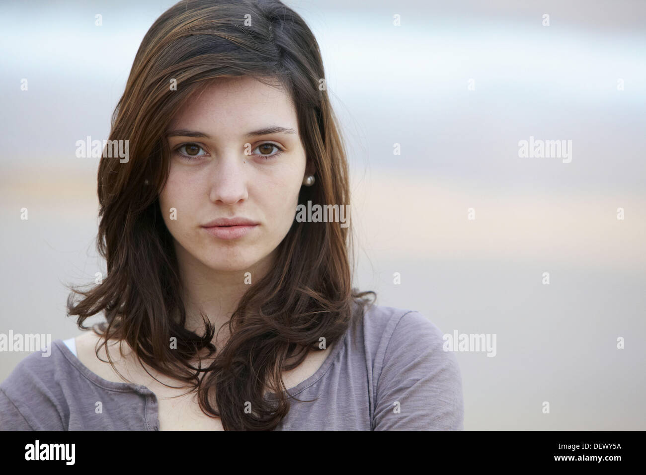 A 20 year old slim attractive healthy young adult woman girl with Stock