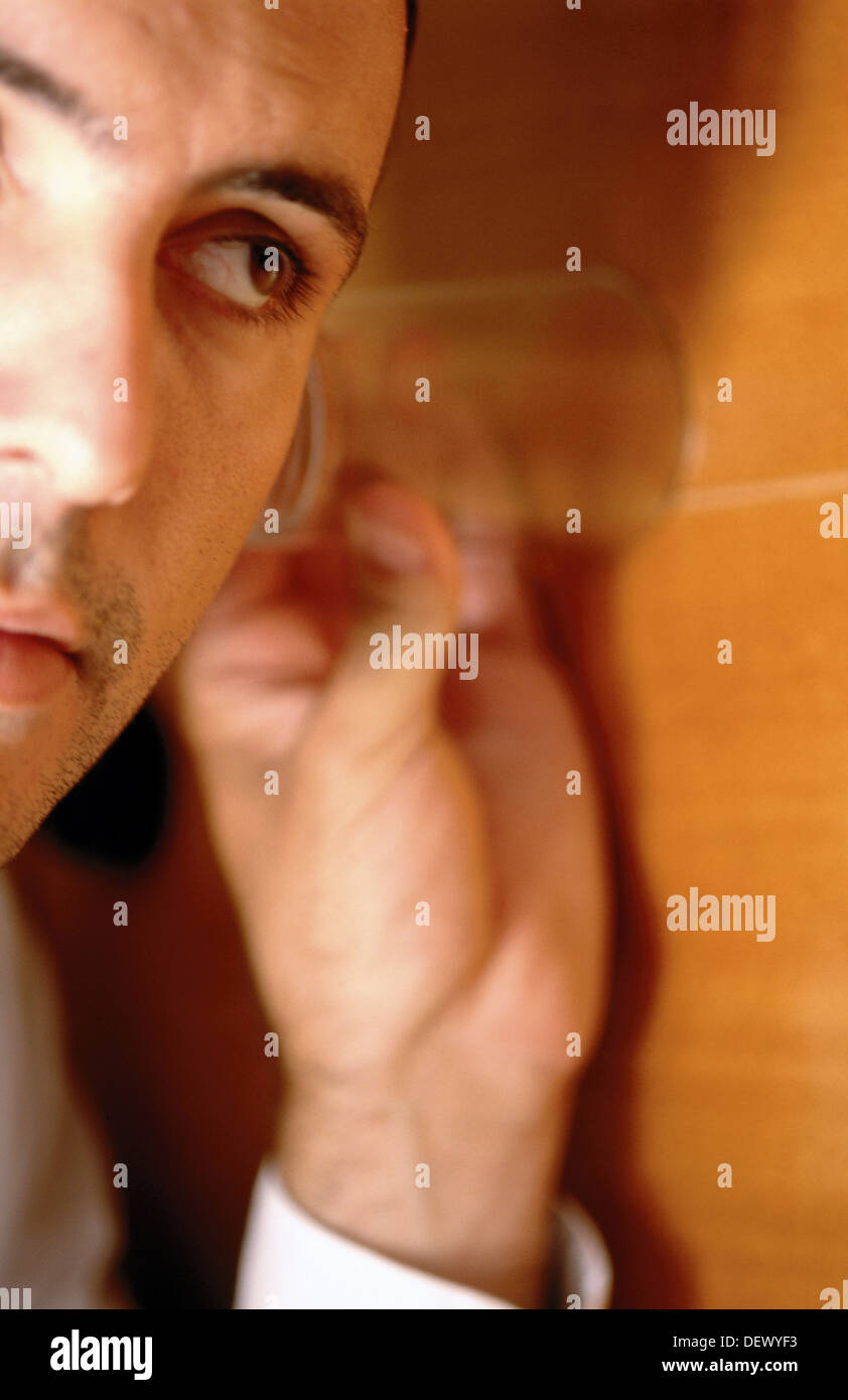 Spying glass to wall hi-res stock photography and images - Alamy