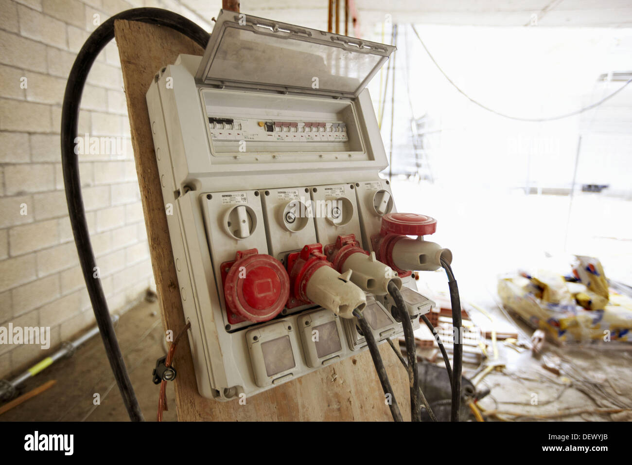 Portable socket outlet, electrical distribution system, church under