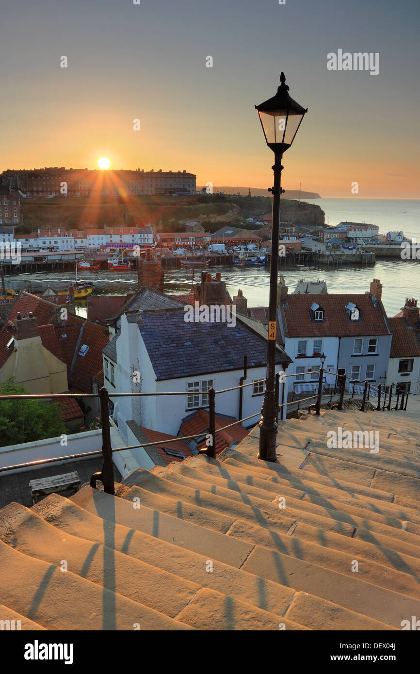 A sunset view of Whitby and the harbour from the famous 199 Steps, North Yorkshire, England Stock Photo