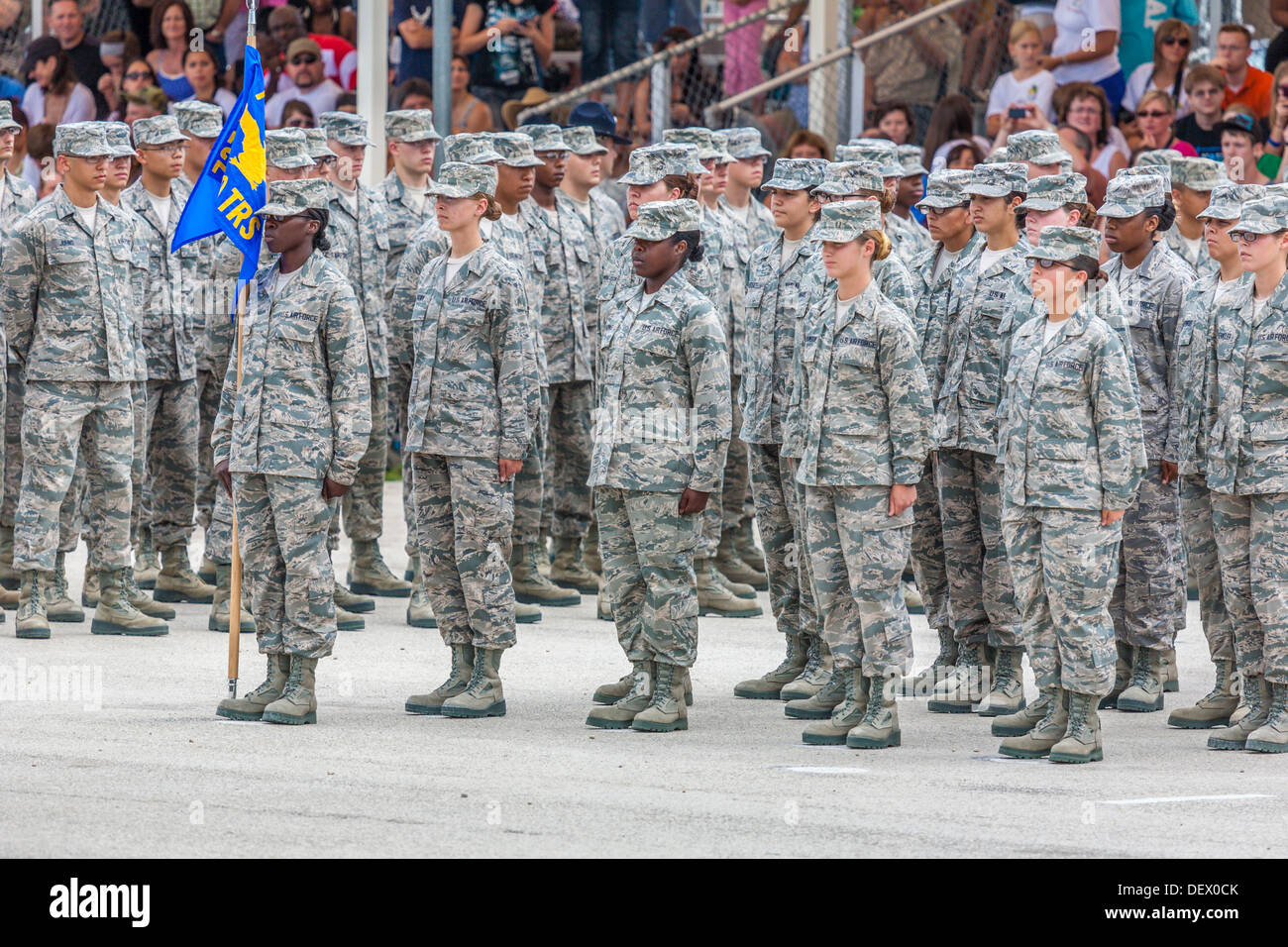 Flight of female airmen at attention in formation during United States Air Force basic training graduation ceremonies Stock Photo