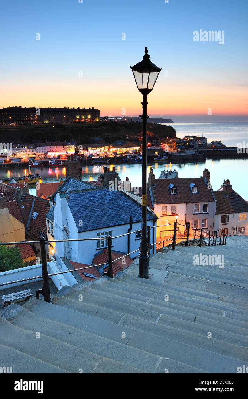 A sunset view of Whitby and the harbour from the famous 199 Steps, North Yorkshire, England Stock Photo