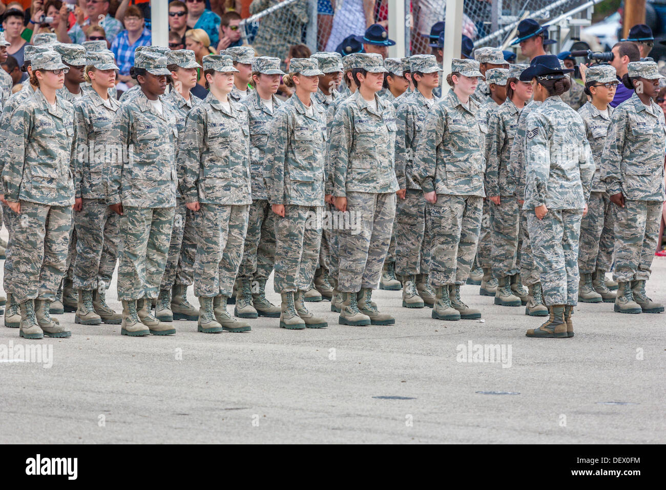 Flight of female airmen at attention in formation during United States Air Force basic training graduation ceremonies Stock Photo