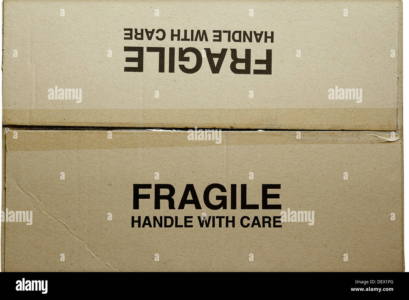 Closeup of fragile words on cardboard box Stock Photo