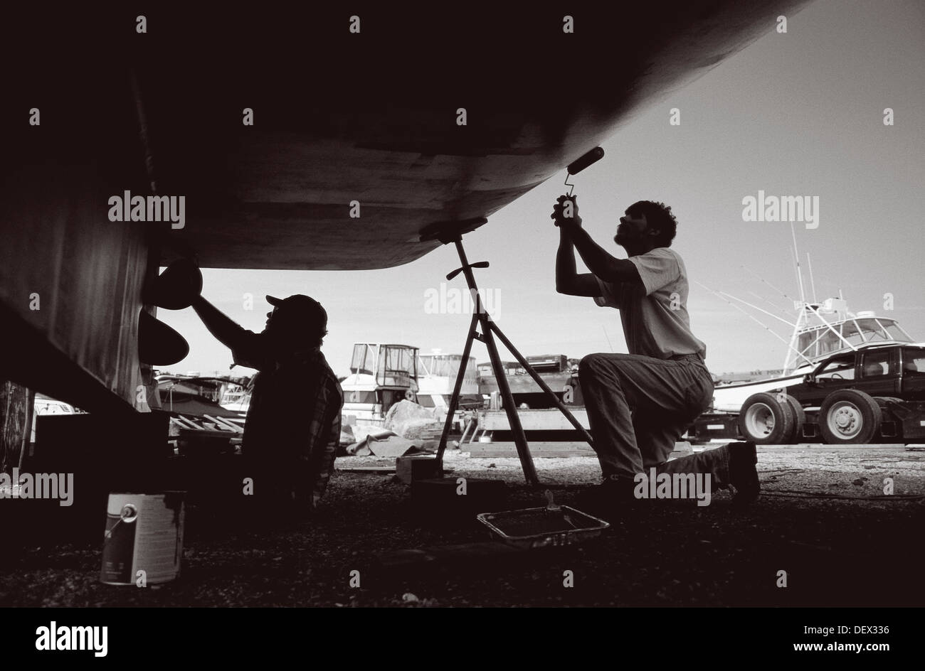 Painting boat hull Stock Photo Alamy