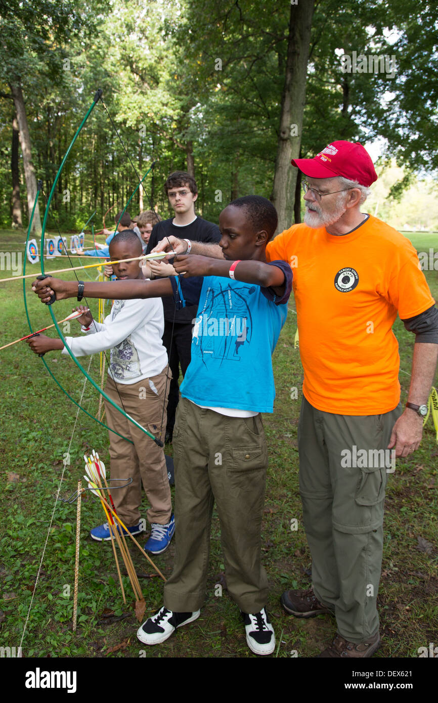 New Boston, Michigan Boy Scouts learn archery at a weekend gathering