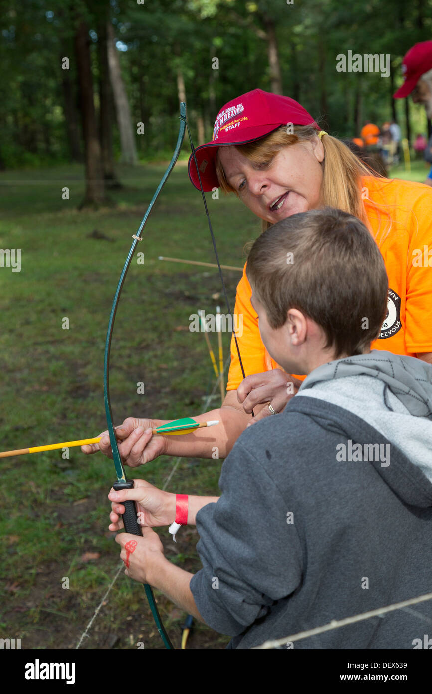 New Boston, Michigan Boy Scouts learn archery at a weekend gathering
