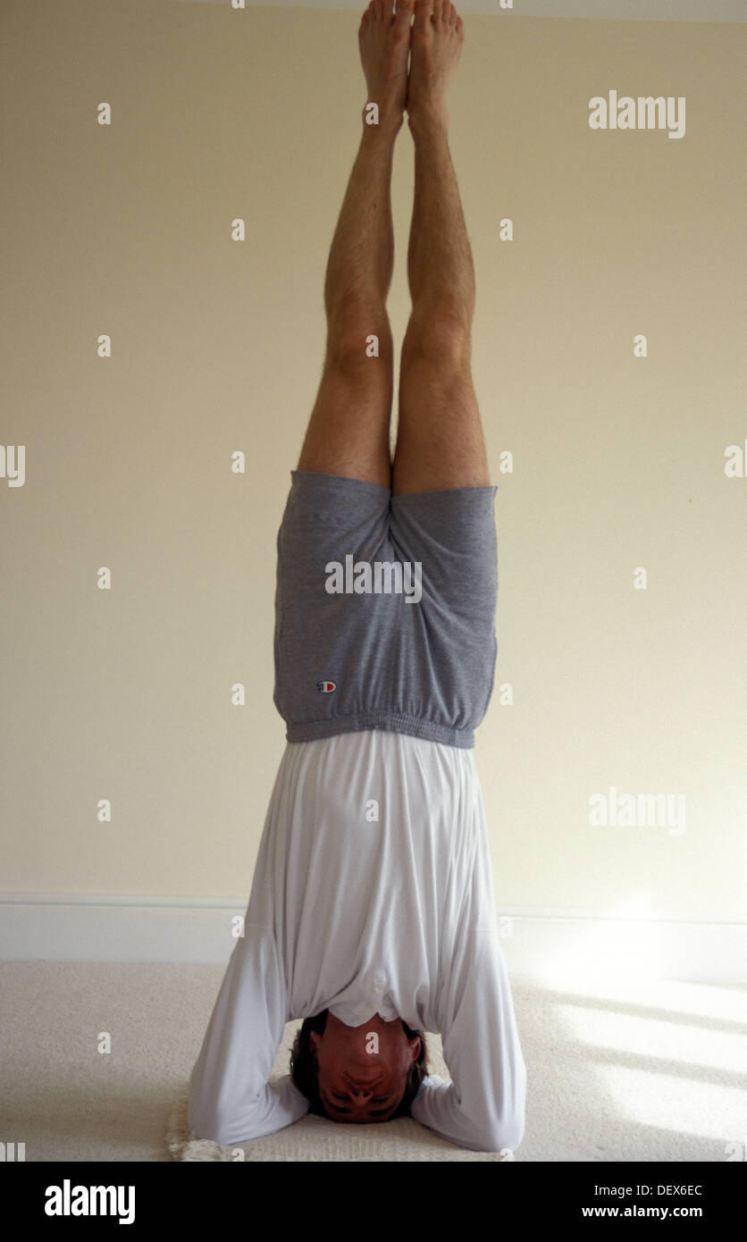 Yogic headstand hires stock photography and images Alamy
