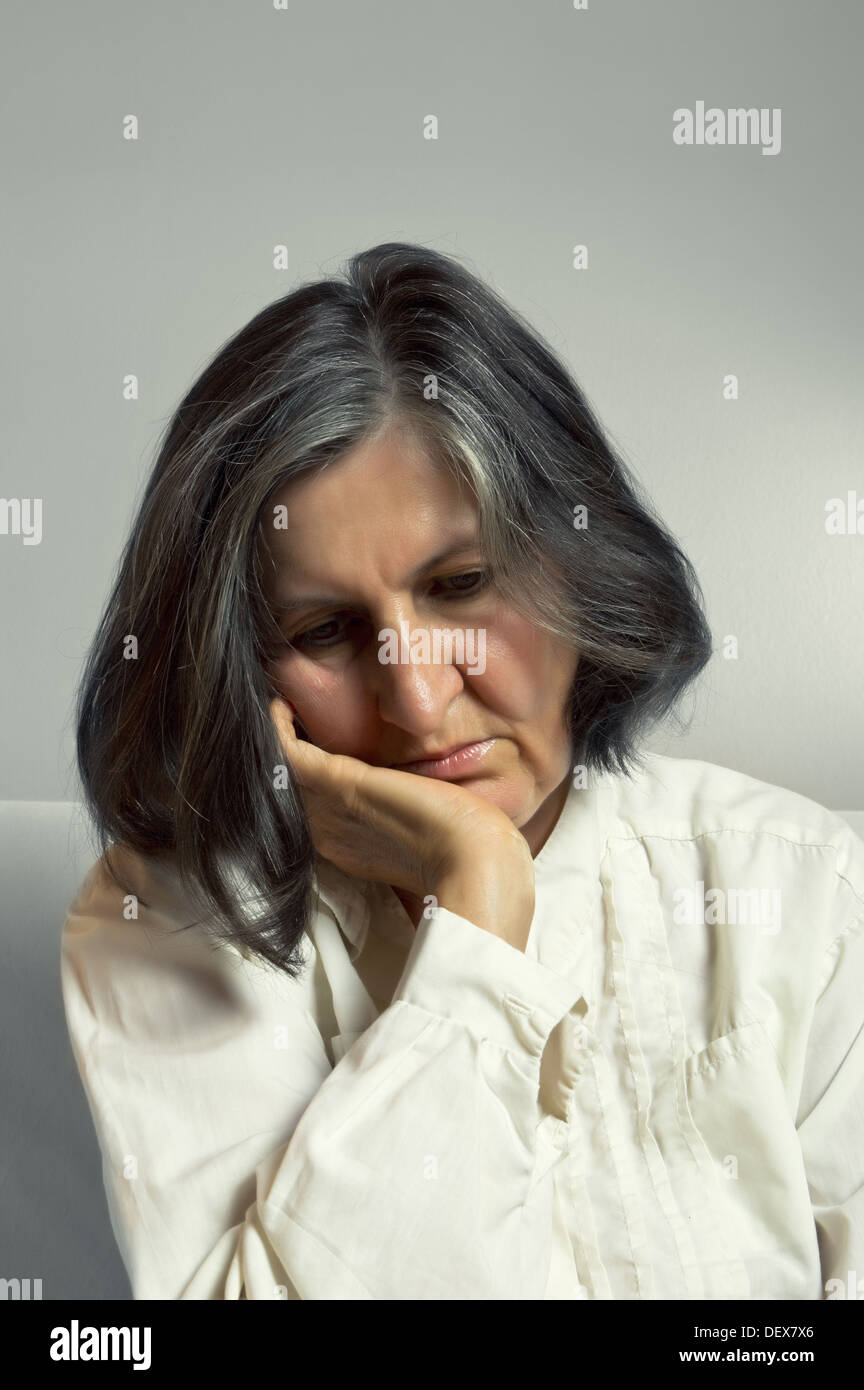 Portrait of sad lonely pensive middle aged woman Stock Photo - Alamy