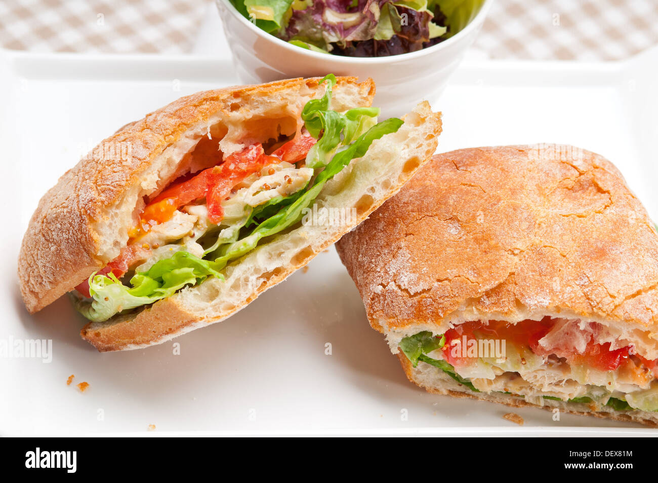 italian ciabatta panini sandwich with chicken and tomato Stock Photo