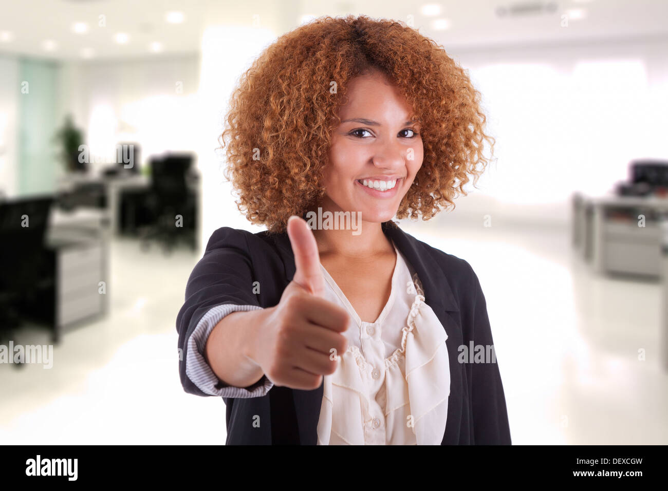 Portrait of a young african american business woman thumbs up, isolated ...