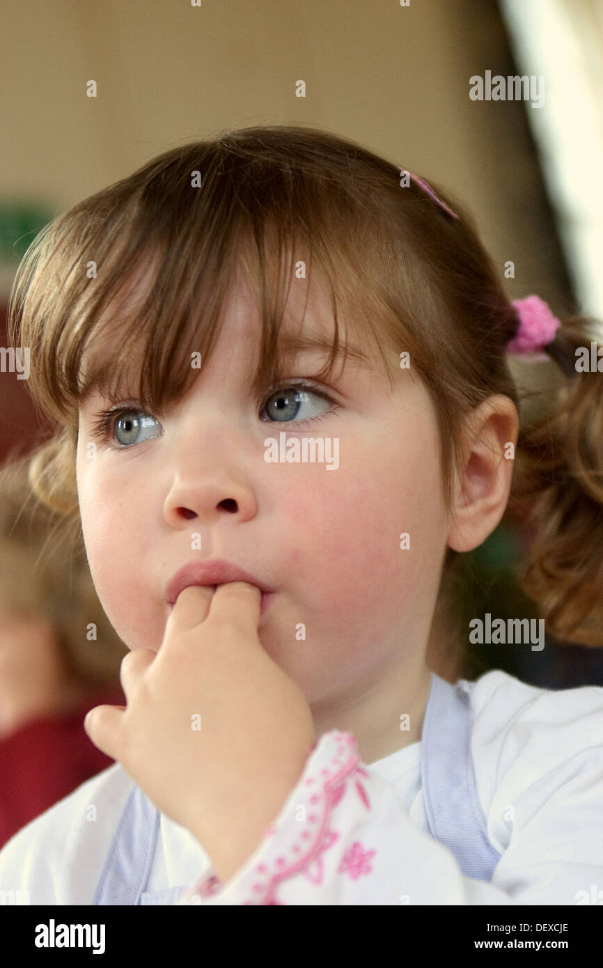 Blond haired three year old girl hi-res stock photography and images