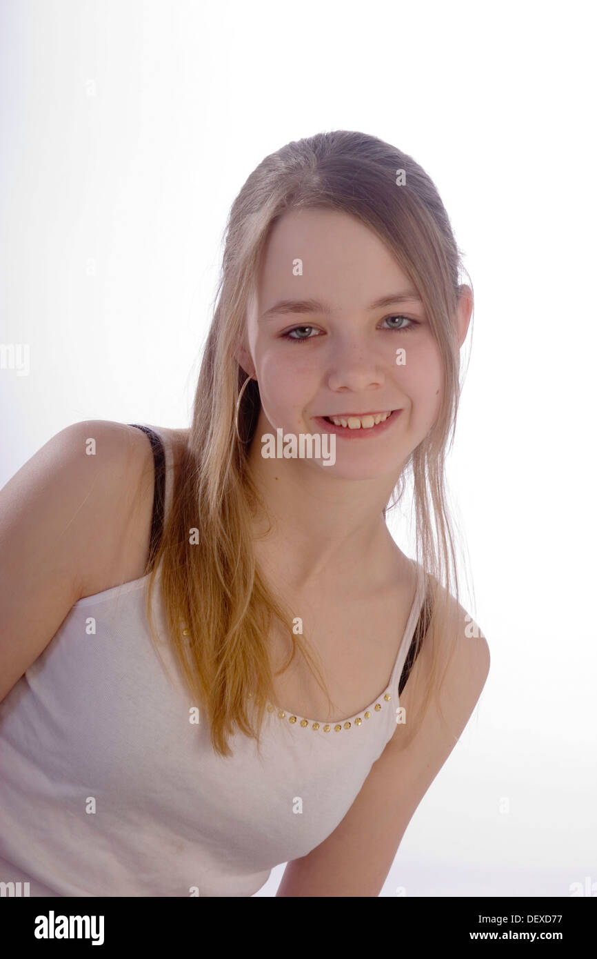 12 year old girl smiling into camera Stock Photo - Alamy