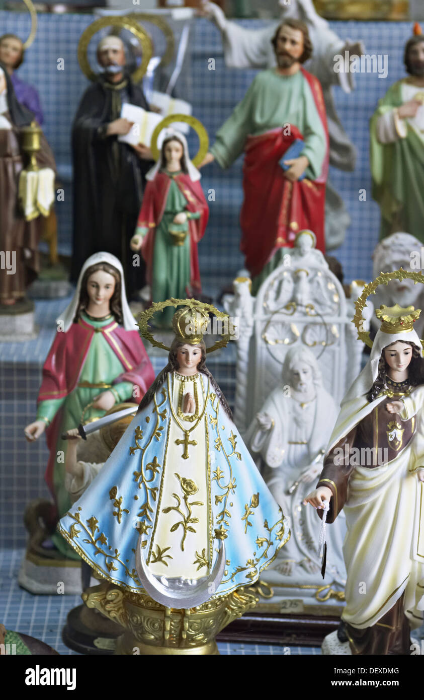 Illinois. Chicago. Religious statues displayed in store window