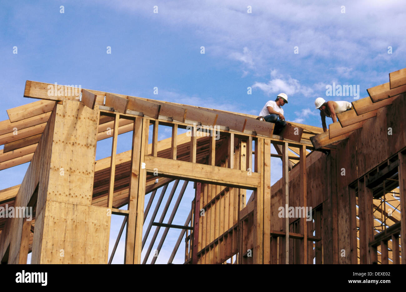 Carpenters framing a roof. Grass Valley, California. USA Stock Photo