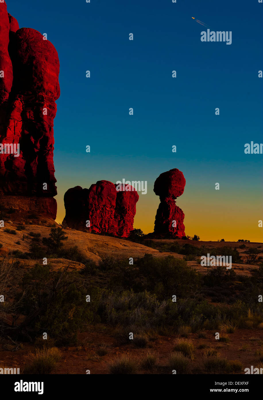 A vertical page image of Balanced Rock at sunset,Arches National Park,Moab Utah Stock Photo