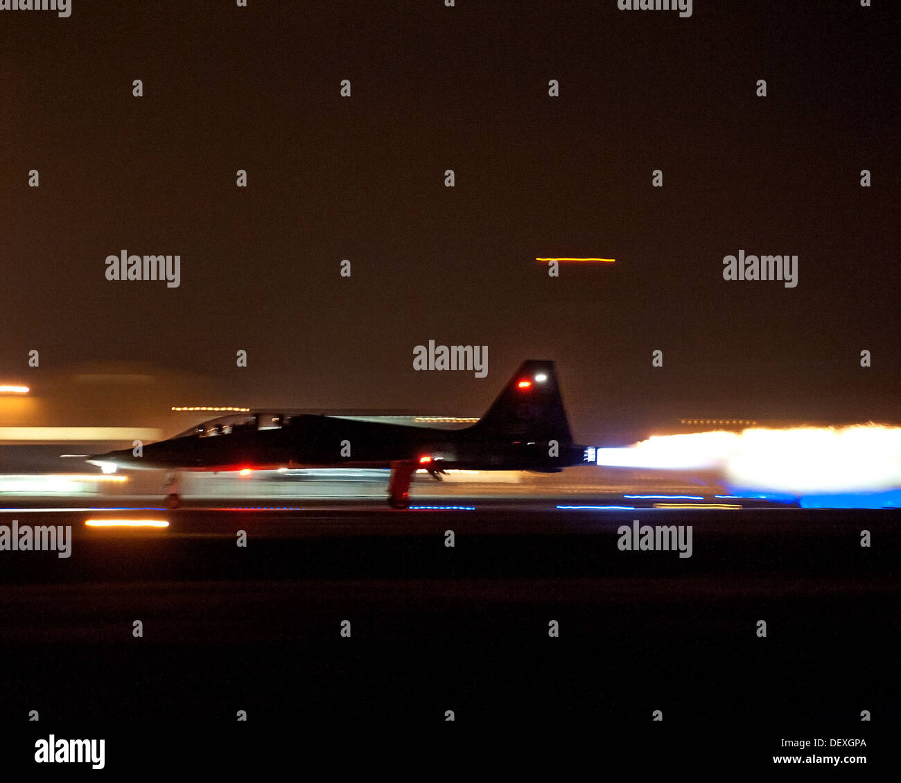 An 80th Flying Training Wing Euro-NATO Joint Jet Pilot Training Program pilot takes off for a night flight in a T-38A Talon, Sept. 12, 2013, at Sheppard Air Force Base, Texas. Pilots train to fly in any kind of instrument weather condition, to be comforta Stock Photo