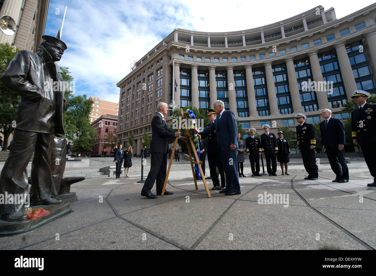 Secretary of Defense Chuck Hagel and Chairman of the Joint Chiefs of Staff Gen. Martin Dempsey lay a wreath at the Navy Memorial in Washington. The defense leaders held the ceremony to honor the 12 victims of a shooting Sept. 16, 2013, at the Washington N Stock Photo