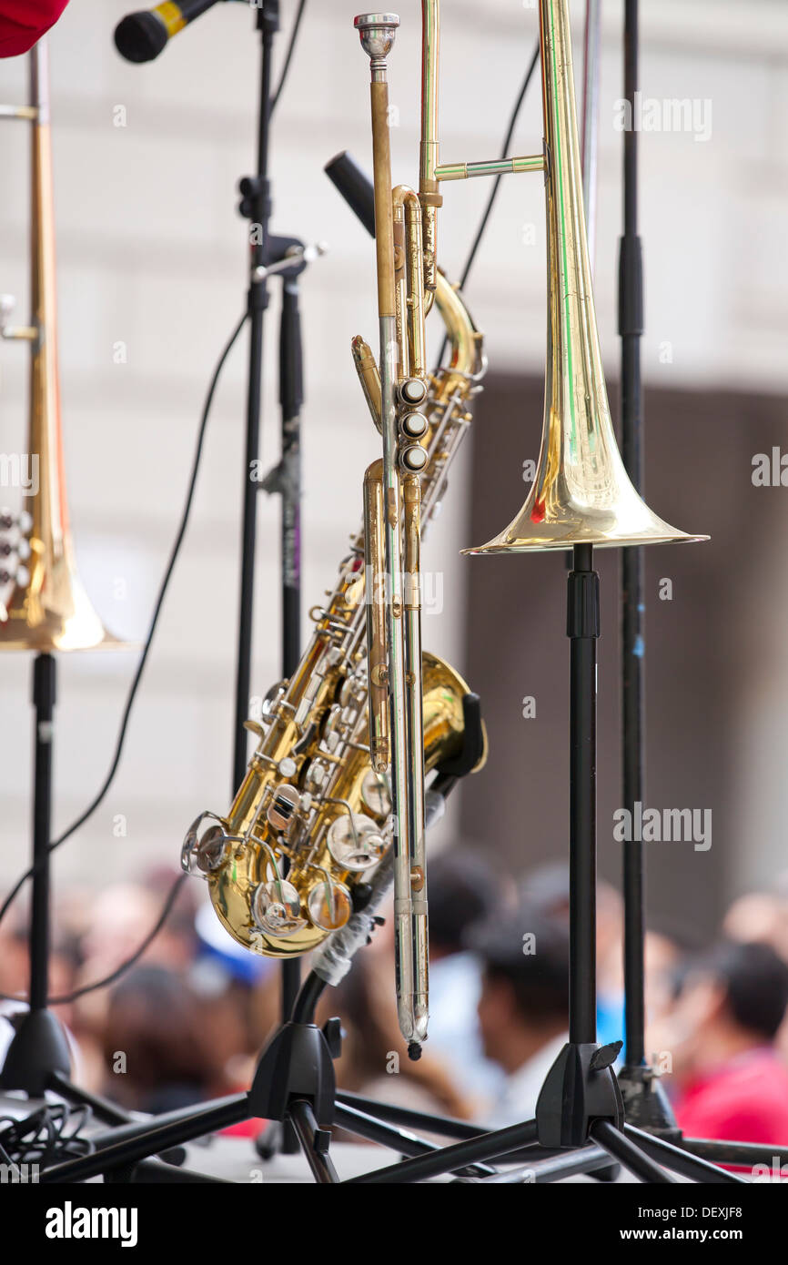 Saxophone and Trumpets on stands Stock Photo