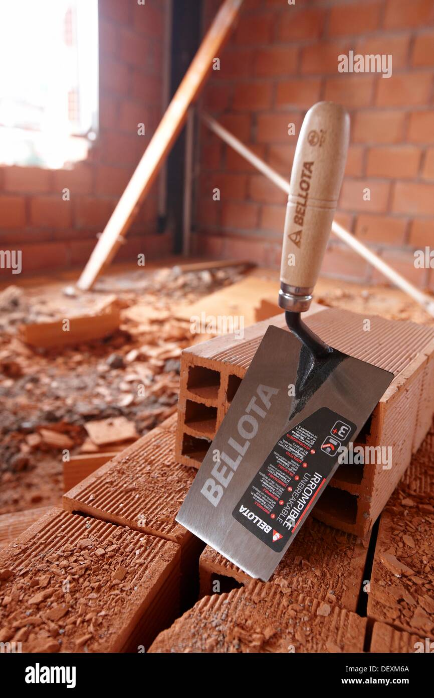 Trowel, construction site Stock Photo Alamy