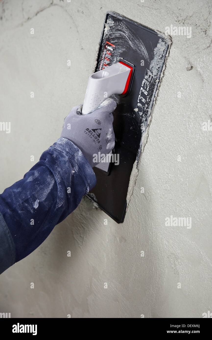 Roughcast, plastering trowel, new homes under construction