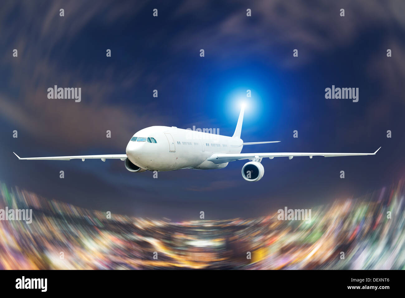 Large passenger plane flying in the sky Stock Photo