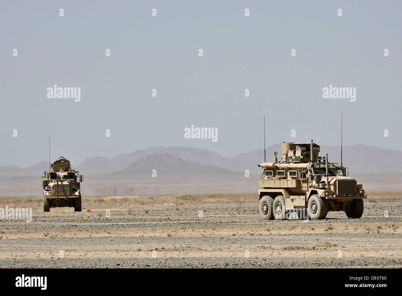 Afghan National Army (ANA) and Coalition Forces conduct patrols in Barrmo, Washir district, Afghanistan, Sept. 19, 2013. The ANA and Coalition Forces conducted mounted and dismounted patrolling and engaged local nationals to prevent insurgency. Stock Photo