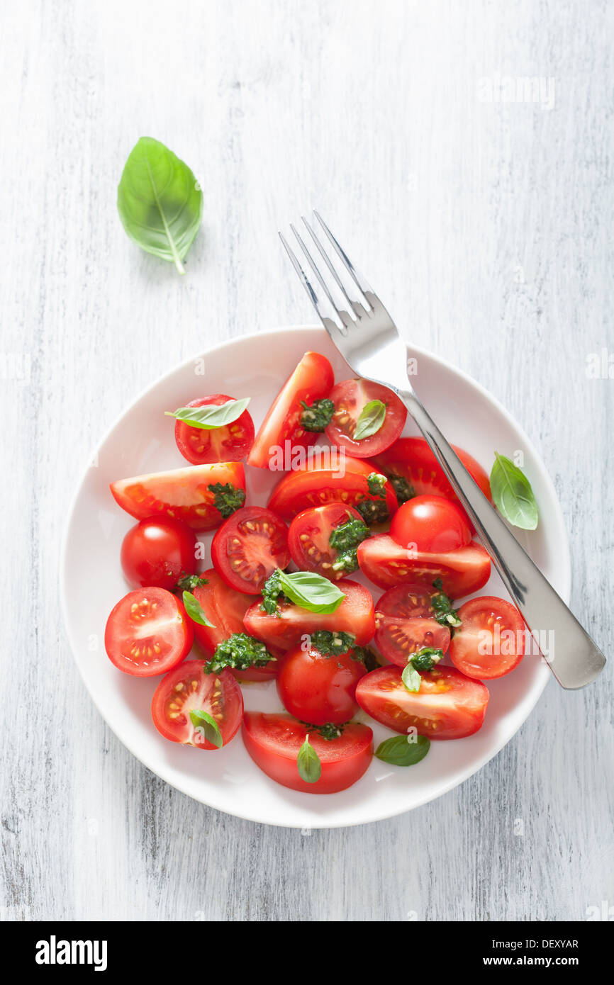 tomato salad with basil dressing Stock Photo Alamy