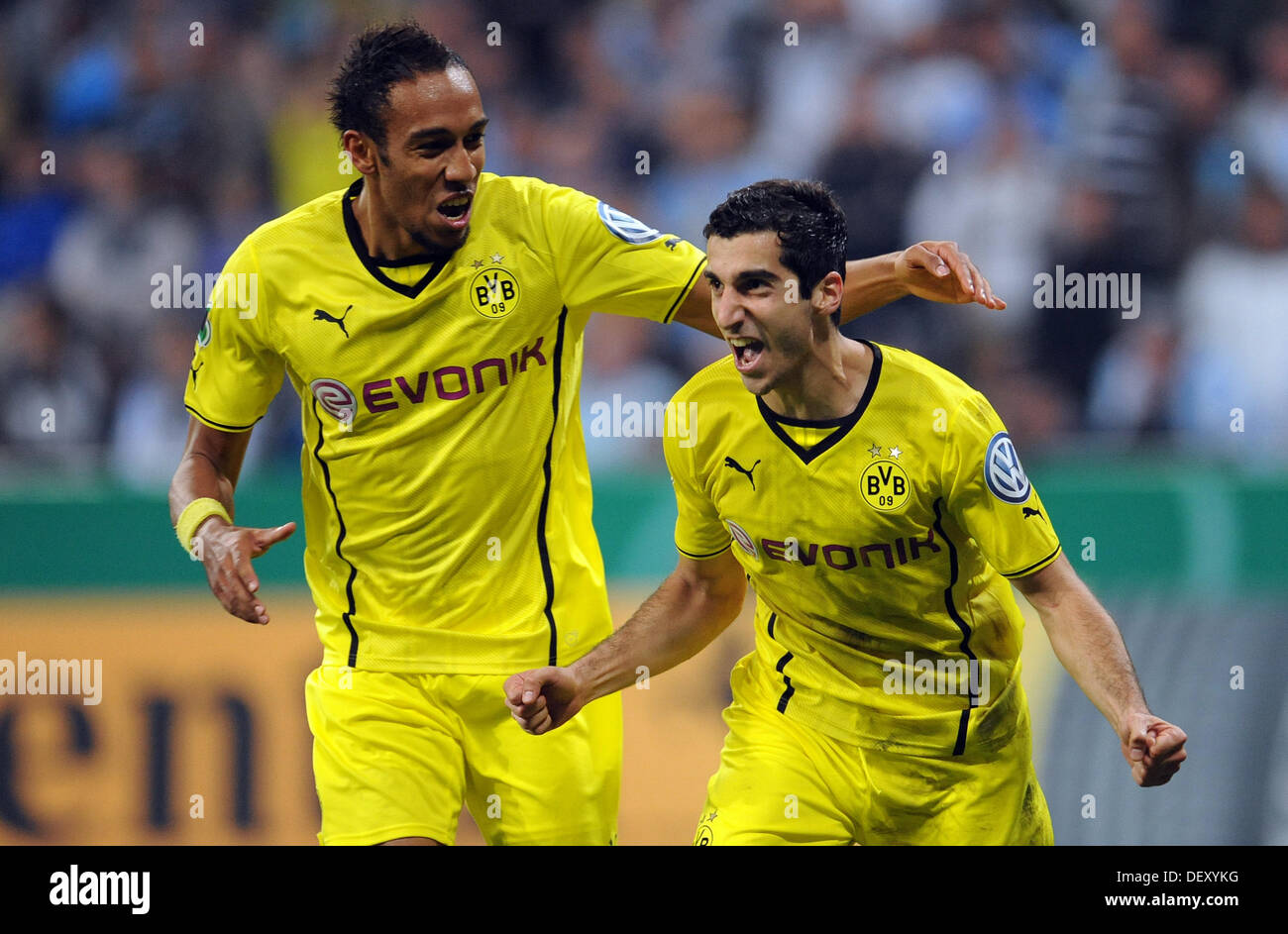Munich, Germany. 24th Sep, 2013. Dortmund's Pierre-Emerick Aubameyang (L) and Henrich Mchitarjan celebrate the 2-0 goal during the DFB Cup second round match between TSV 1860 Munich and Borussia Dortmund at Allianz Arena in Munich, Germany, 24 September 2013. Photo: ANDREAS GEBERT/dpa/Alamy Live News Stock Photo
