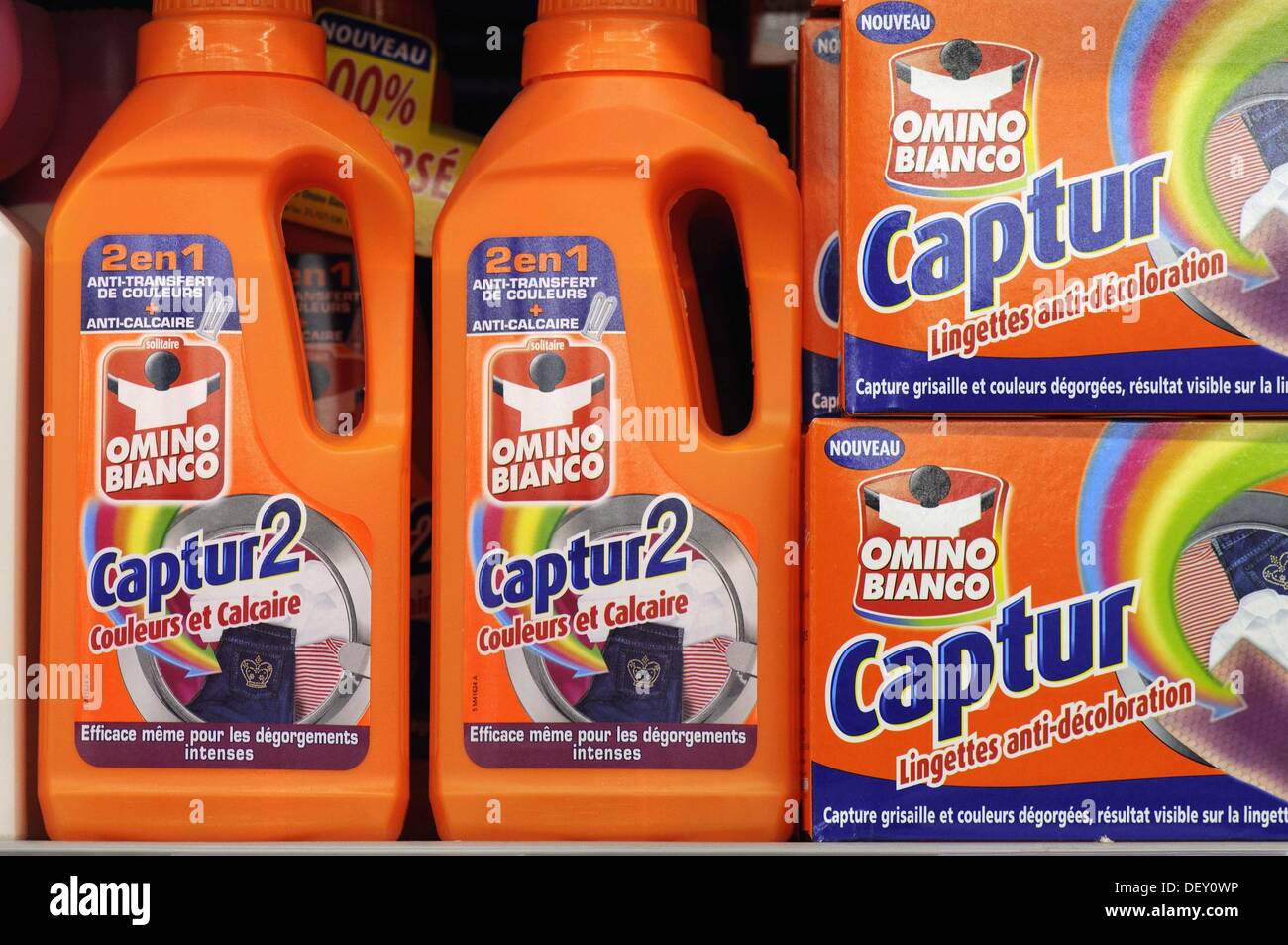 Powder and liquid laundry detergents in a supermarket, France Stock