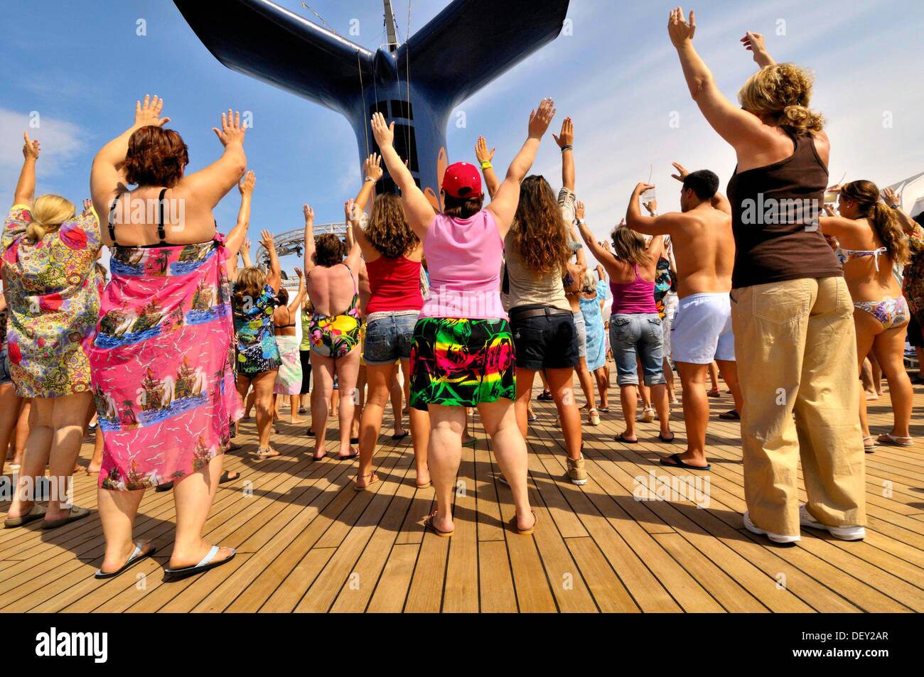 Passengers dancing on the deck of a cruise ship Stock Photo Alamy