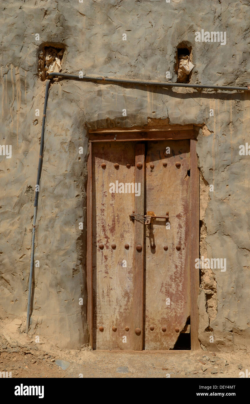 Oman old wooden door wall hi-res stock photography and images - Alamy