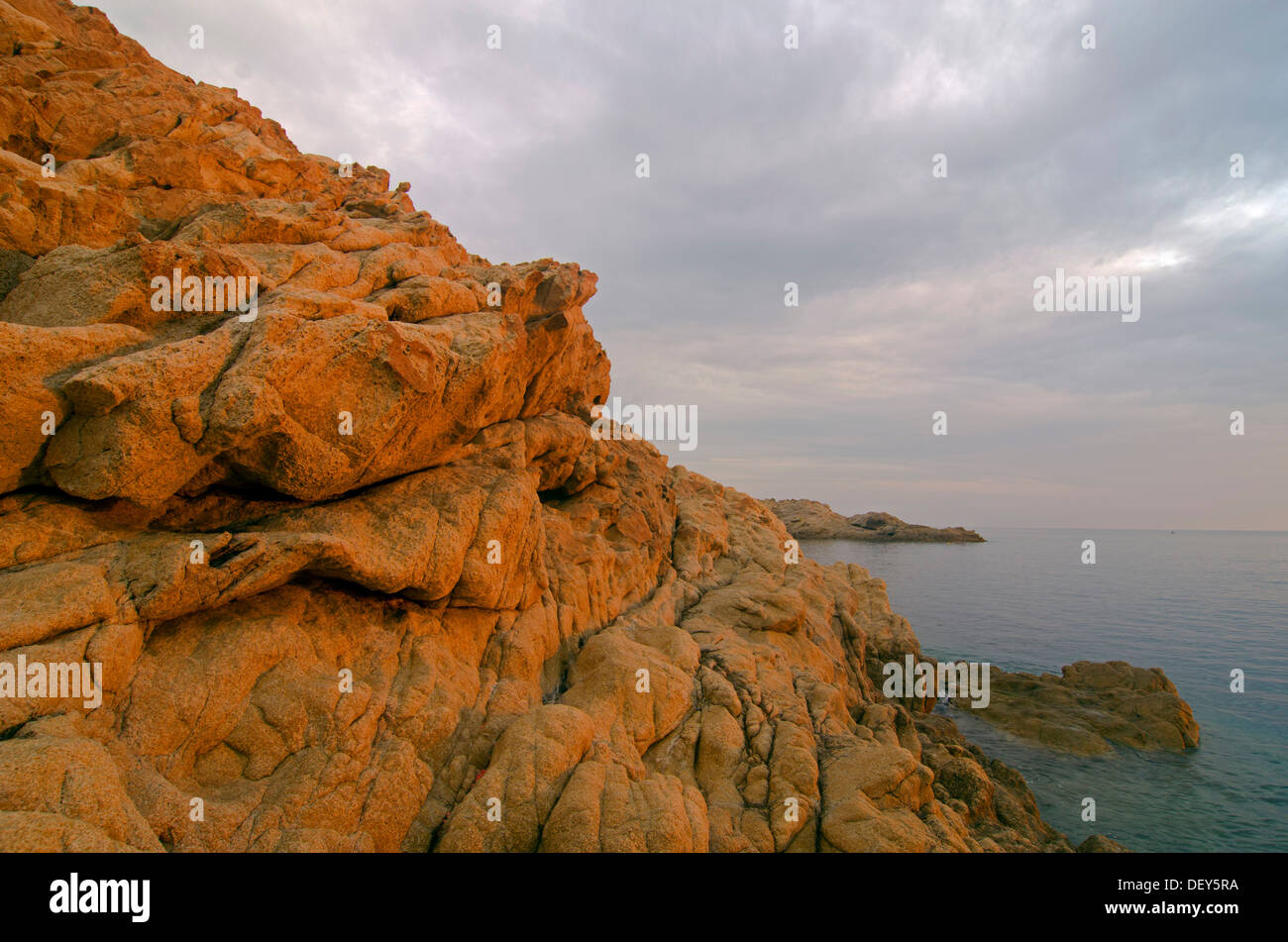 The red granite rocks of the island Ile de la Pietra near L'Île-Rousse ...