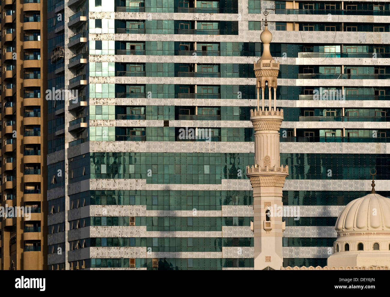 Mosque in front of a high-rise building, Sharjah, United Arab Emirates, Middle East Stock Photo