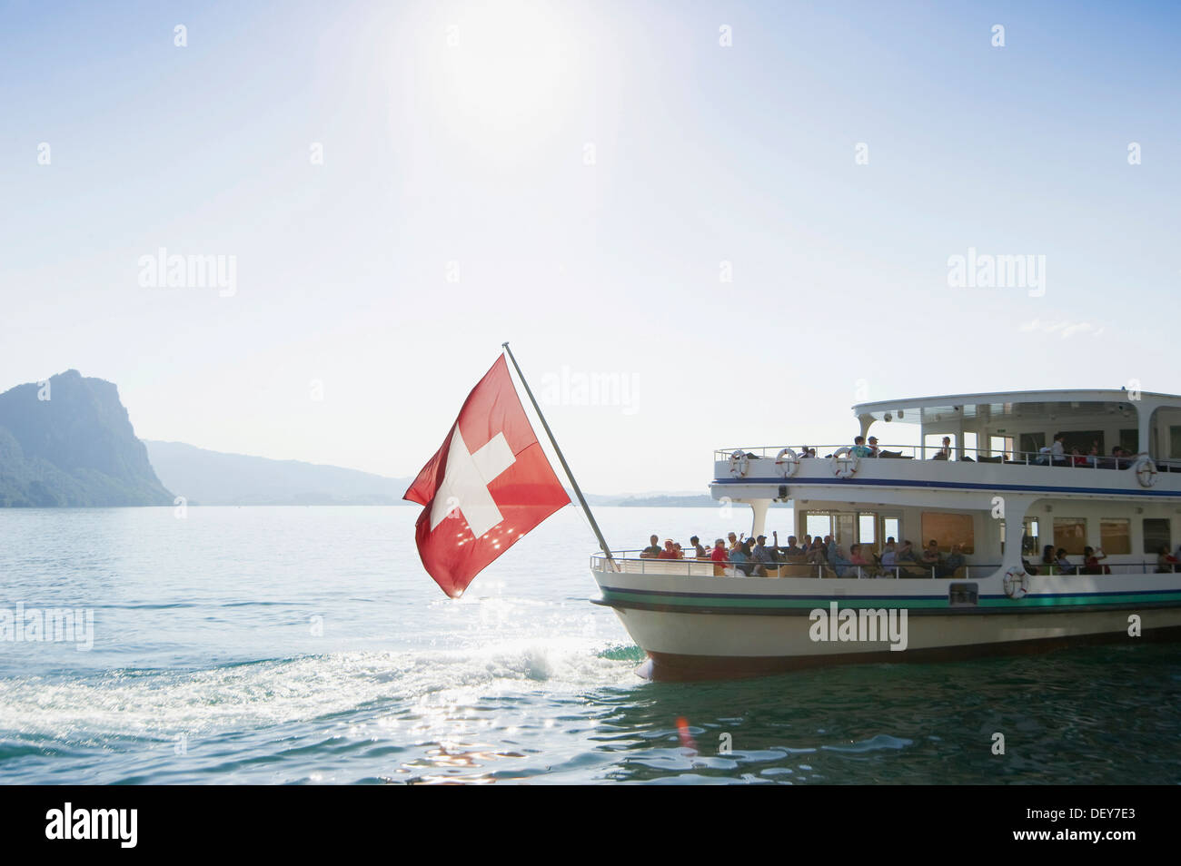 Passenger boat, liner, with the Swiss flag, Vitznau, Lake Lucerne, Canton of Lucerne, Switzerland, Europe Stock Photo