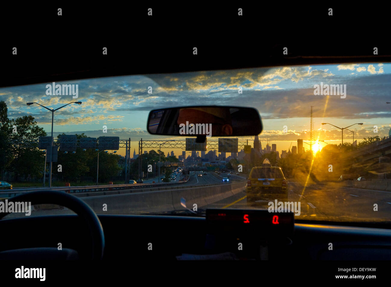 Taxi from the inside, sunset with the Manhattan skyline, New York, USA Stock Photo