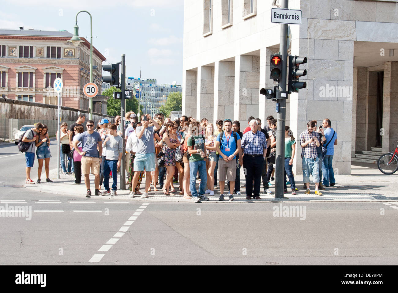 Pedestrians waiting at the traffic lights - Berlin, Germany Stock Photo