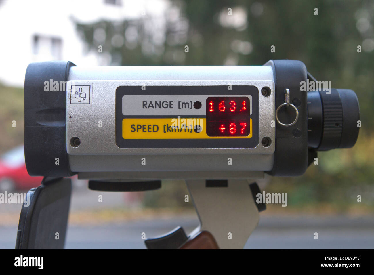 Radar gun showing speed and distance data, the car is going 87 km/h in a 70km/h zone, speed control, on 24/10/2012 Stock Photo