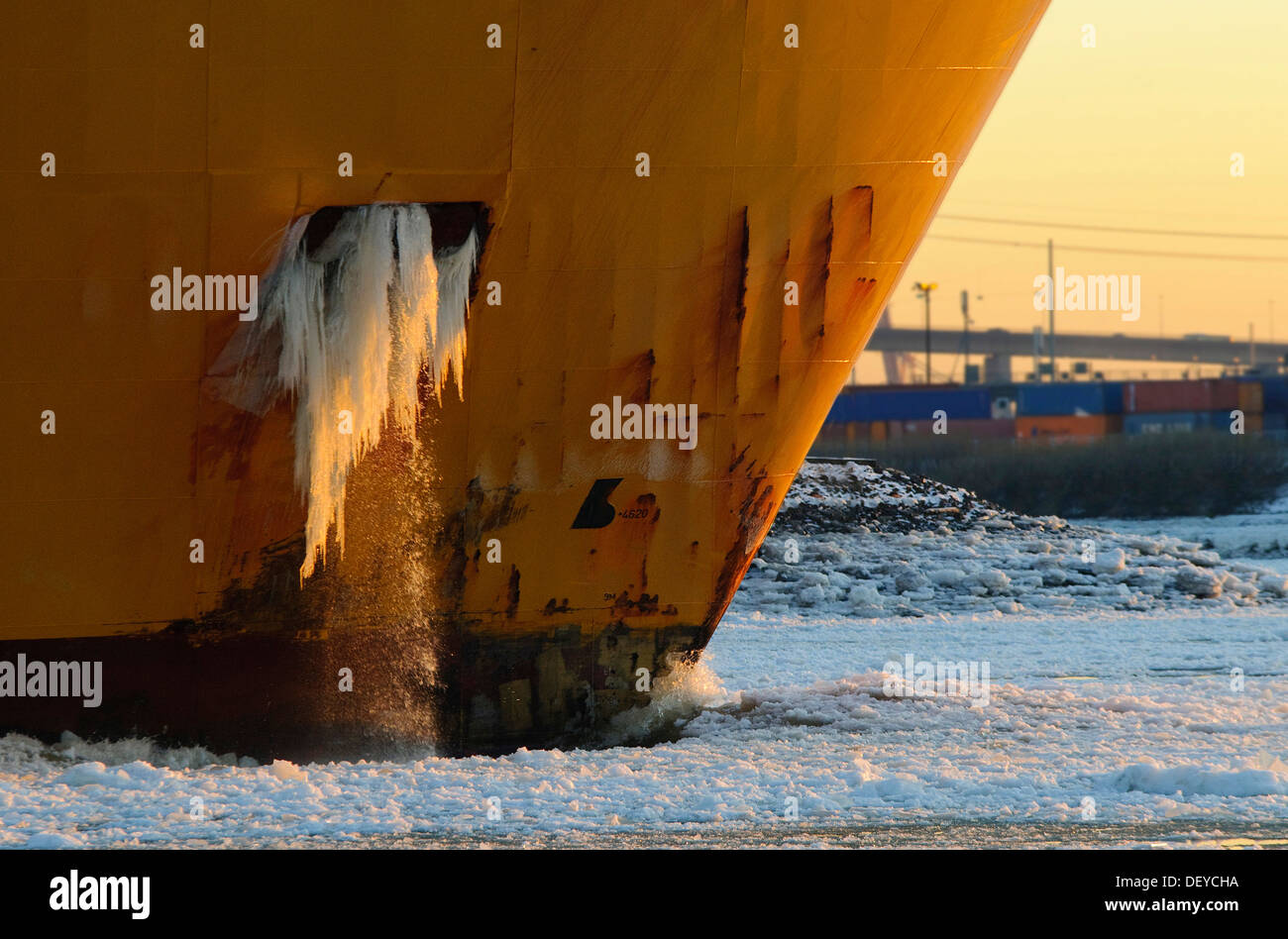 Bow of a container ship on the Elbe river in the wintery port of Hamburg, Hamburg Stock Photo