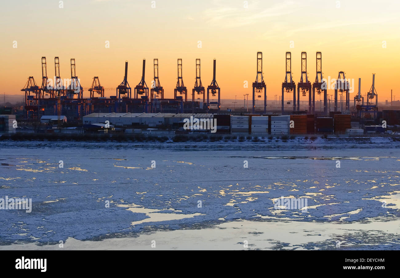 Sunset in the wintery port of Hamburg, Elbe river, Hamburg Stock Photo