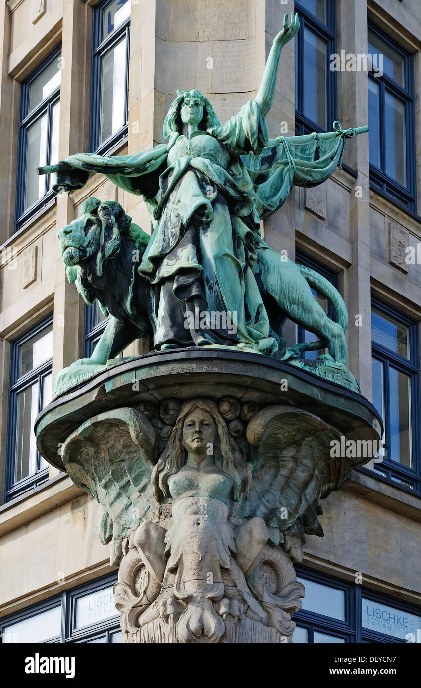 Sculpture on the facade of the Haus der Seefahrt building at the mouth of the Alster River called Nikolaifleet Stock Photo