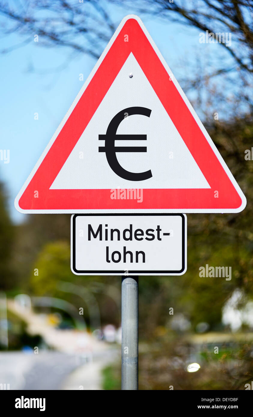 Road sign with eurosign and stroke minimum wage, photomontage, Verkehrsschild mit Eurozeichen und Schriftzug Mindestlohn, Fotomo Stock Photo