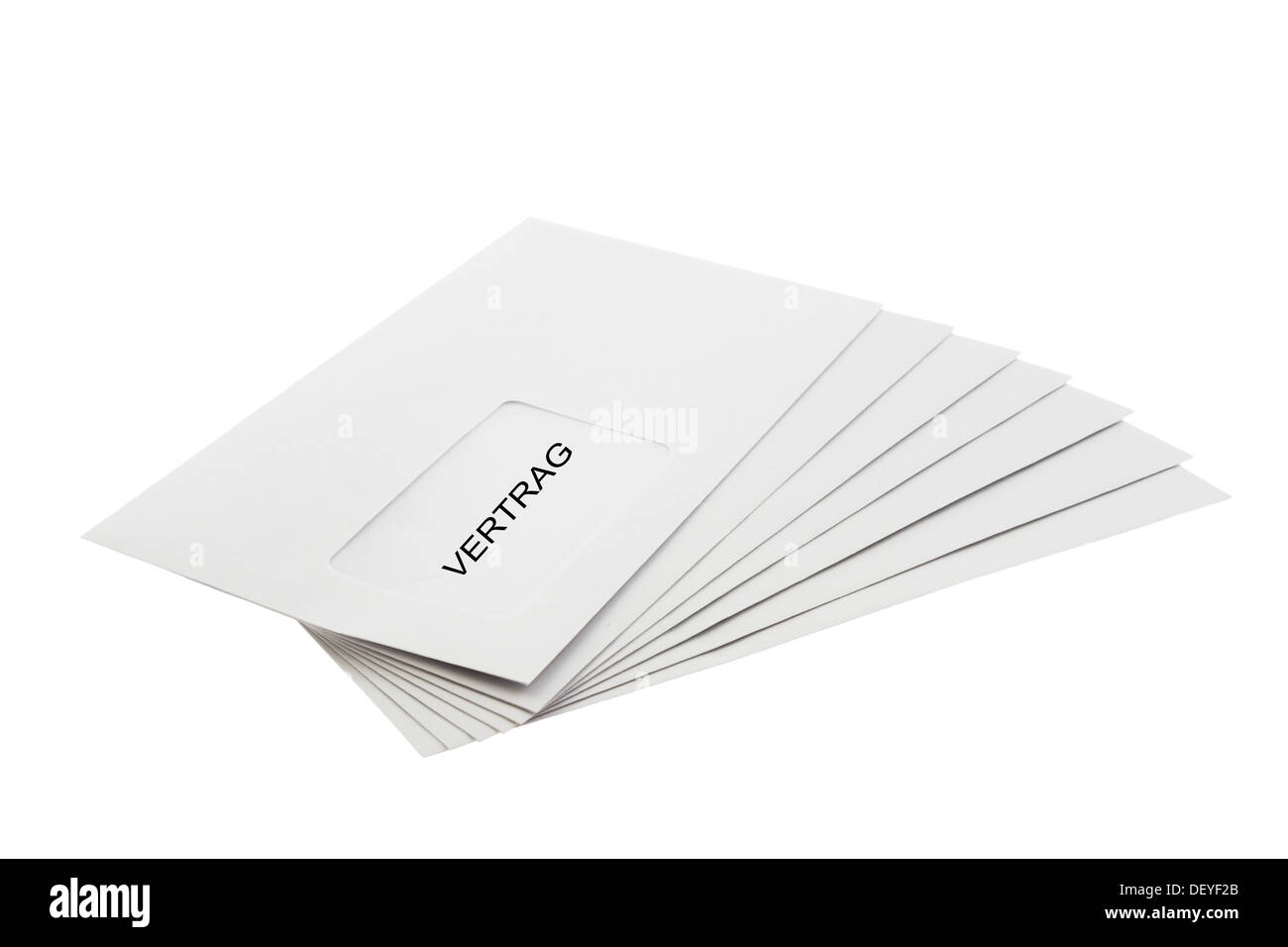 A Batch of Envelopes labeled with the word Vertrag (German contract) isolated on White Background Stock Photo