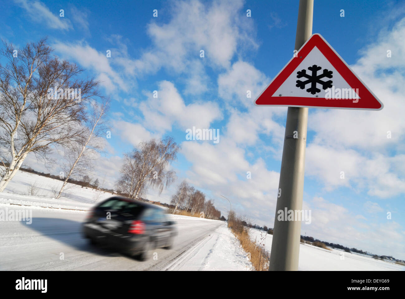 Car on snow-covered roads, slippery roads Stock Photo