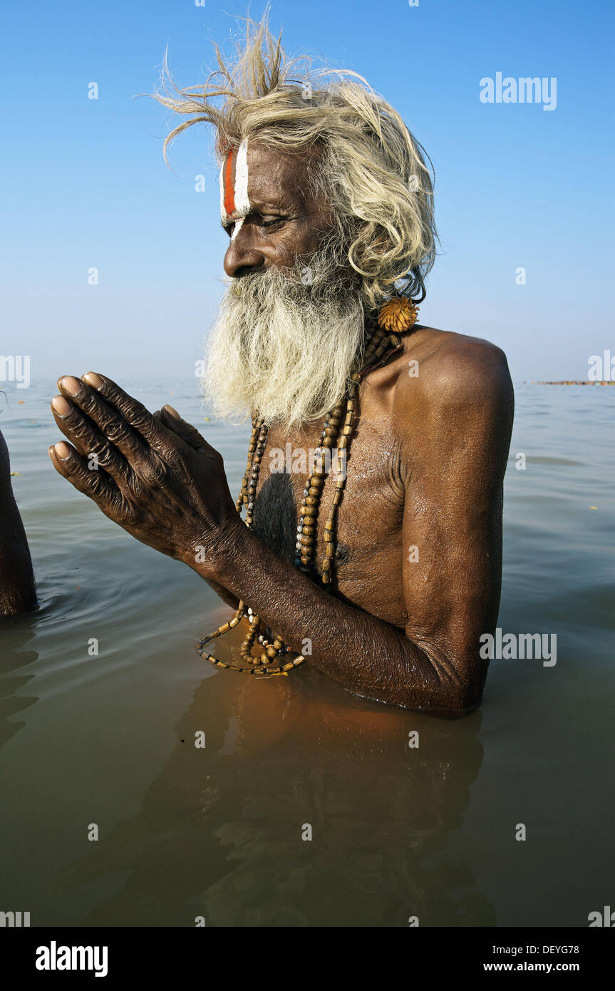 Pilgrims bathing at the confluence of the river Ganges and the Bay of Bengal. Sagar Mela. Ganges River. India. Stock Photo
