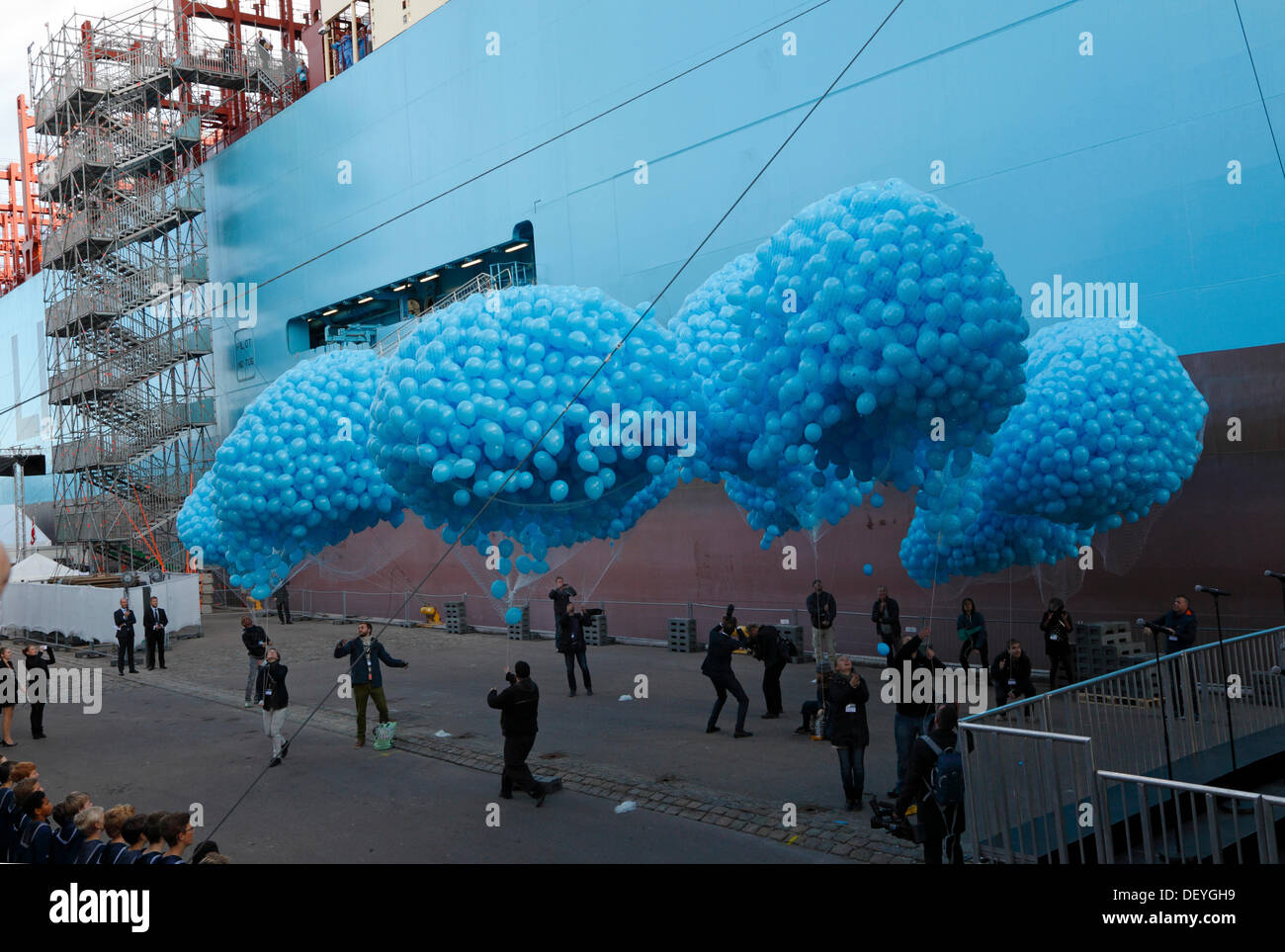 Copenhagen, September 25th, 2013. Today HRH Crown Princess Mary of Denmark officially named the triple-E container ship Majestic Maersk at Langelinie in the port of Copenhagen. The ceremony also marked the opening of the exhibition area and visits on board the ship to the public.  Numerous clusters of balloons in the well-known Maersk blue colour are released to celebrate the naming of the ship. Credit:  Niels Quist/Alamy Live News Stock Photo